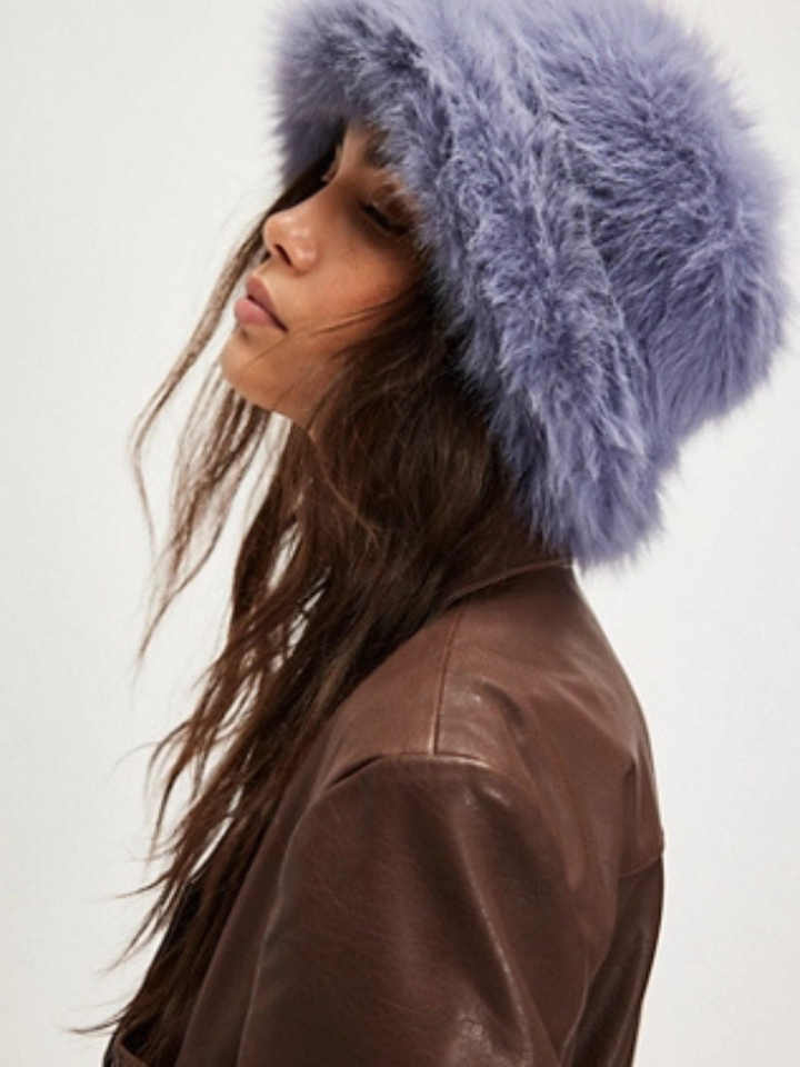 FREE PEOPLE Ice Queen Bucket Hat in plush lavender faux fur on model.