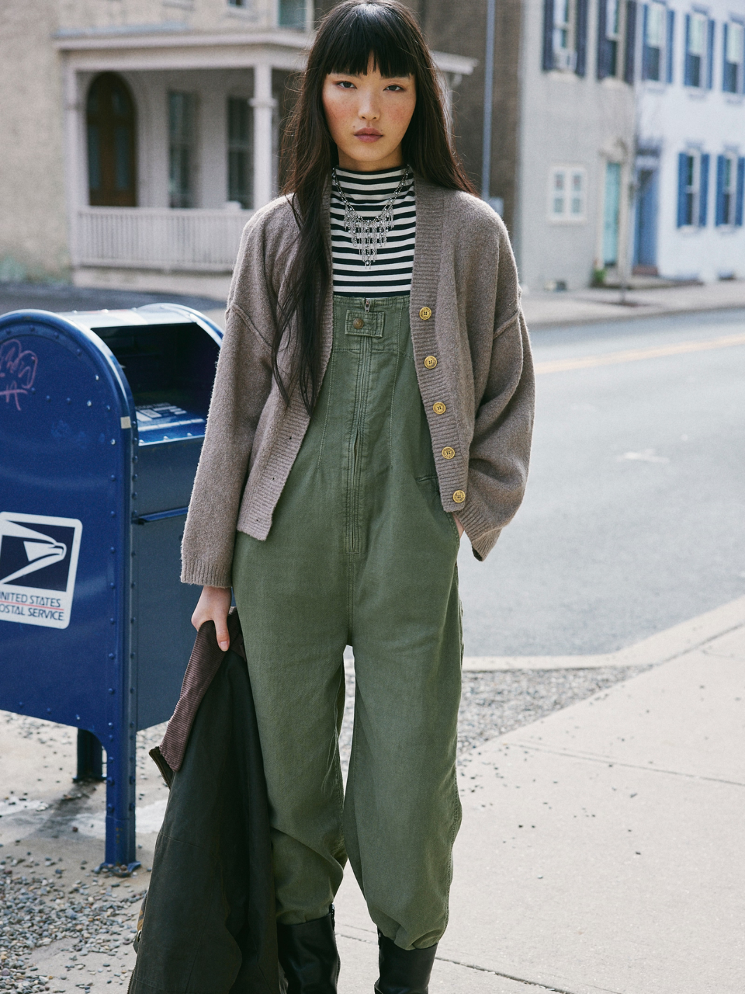 Stylish model in FREE PEOPLE - Jude One Piece Jumpsuit, showcasing relaxed denim and effortless layering vibes.