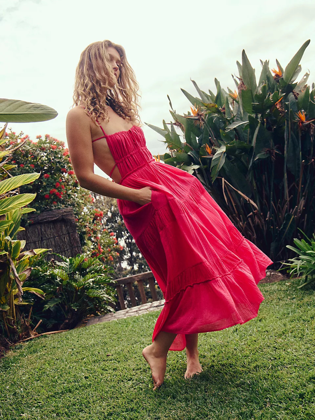 Effortlessly stylish, the FREE PEOPLE - Taking Sides Maxi Dress features a smocked bodice and flowy tiers, perfect for summer.