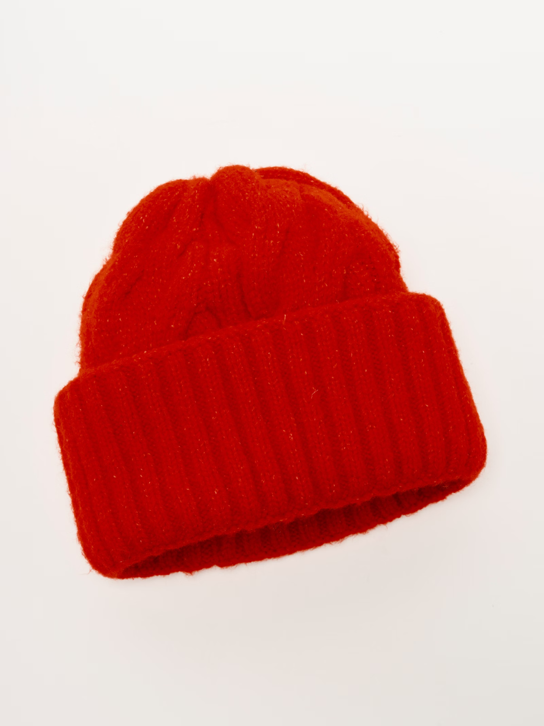 Red Coast Line Beanie by Free People; cozy knit with chunky rib cuff and plush texture.