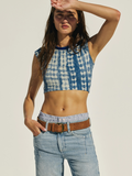 Effortlessly stylish, the FREE PEOPLE - WTF Double Cross Belt adds a cool edge to any outfit with its classic leather design.