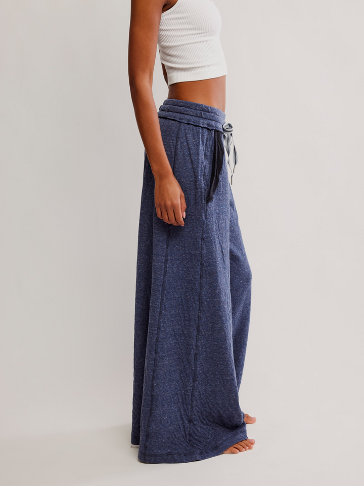 FREE PEOPLE - Wait A Minute Wide-Leg Lounge Pants feature an ultra-cozy design perfect for lounging in style.
