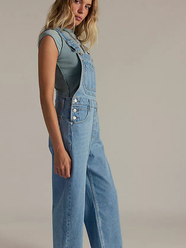 FREE PEOPLE - We The Free Deep Trance Overalls feature a relaxed fit, perfect for a laid-back, stylish look.
