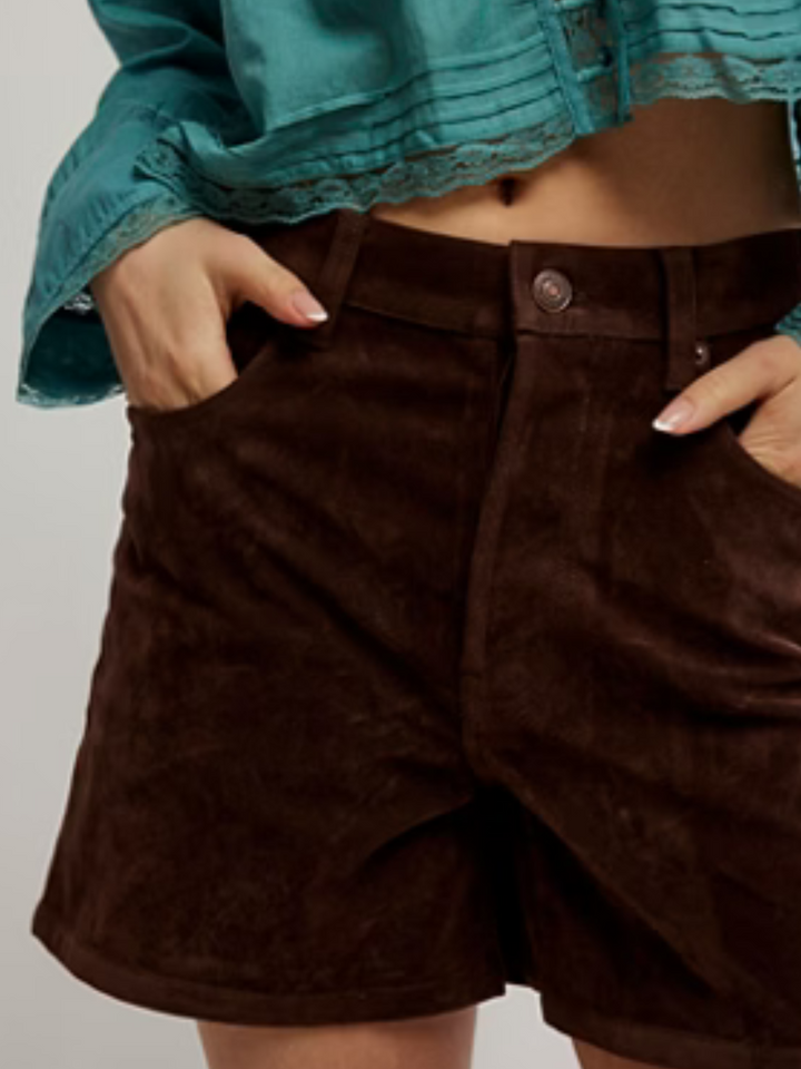 FREE PEOPLE - We The Free Tippi Vegan Suede Short showcases stylish high-rise shorts crafted from soft vegan suede.