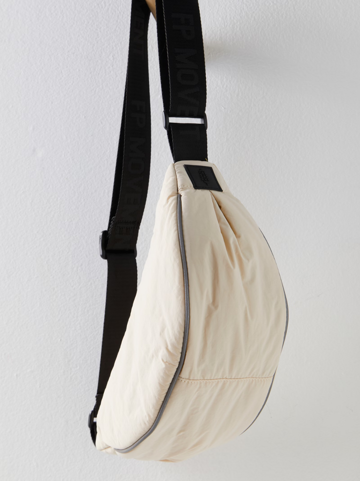 Sleek and functional, the FREE PEOPLE MOVEMENT - Bulls Eye Sling Bag is perfect for stylish, on-the-go adventures.