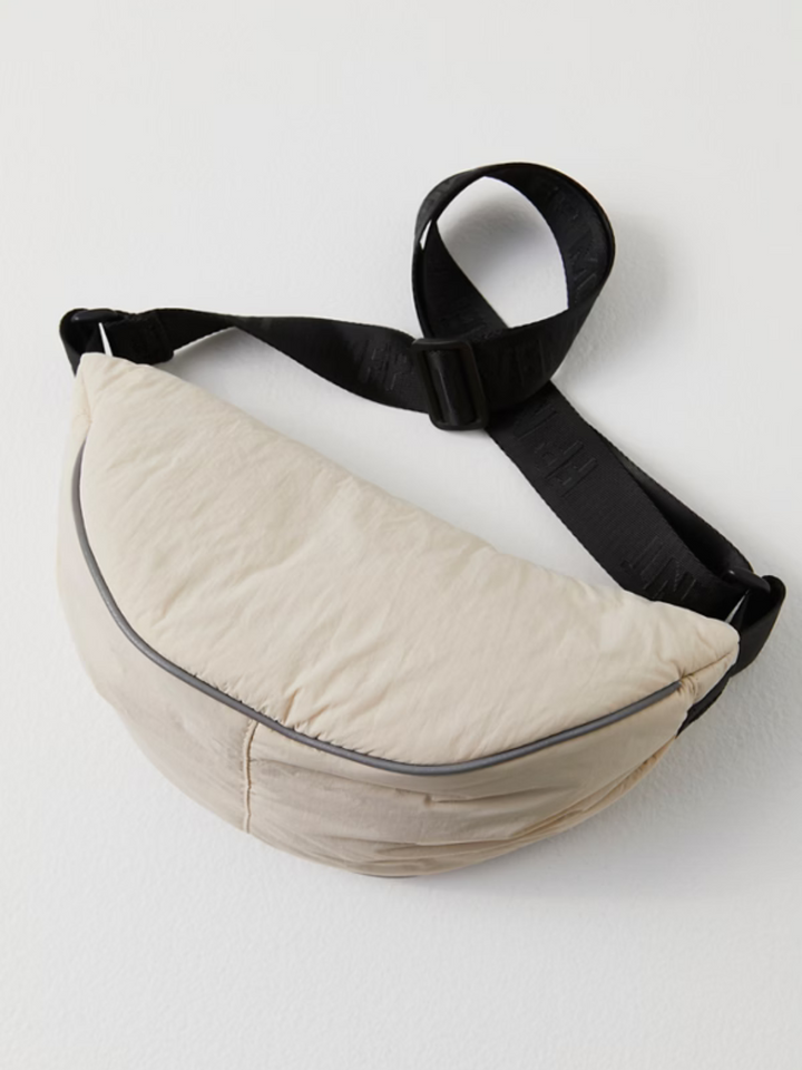 Stylish and functional, the FREE PEOPLE MOVEMENT - Bulls Eye Sling Bag is perfect for on-the-go adventures.