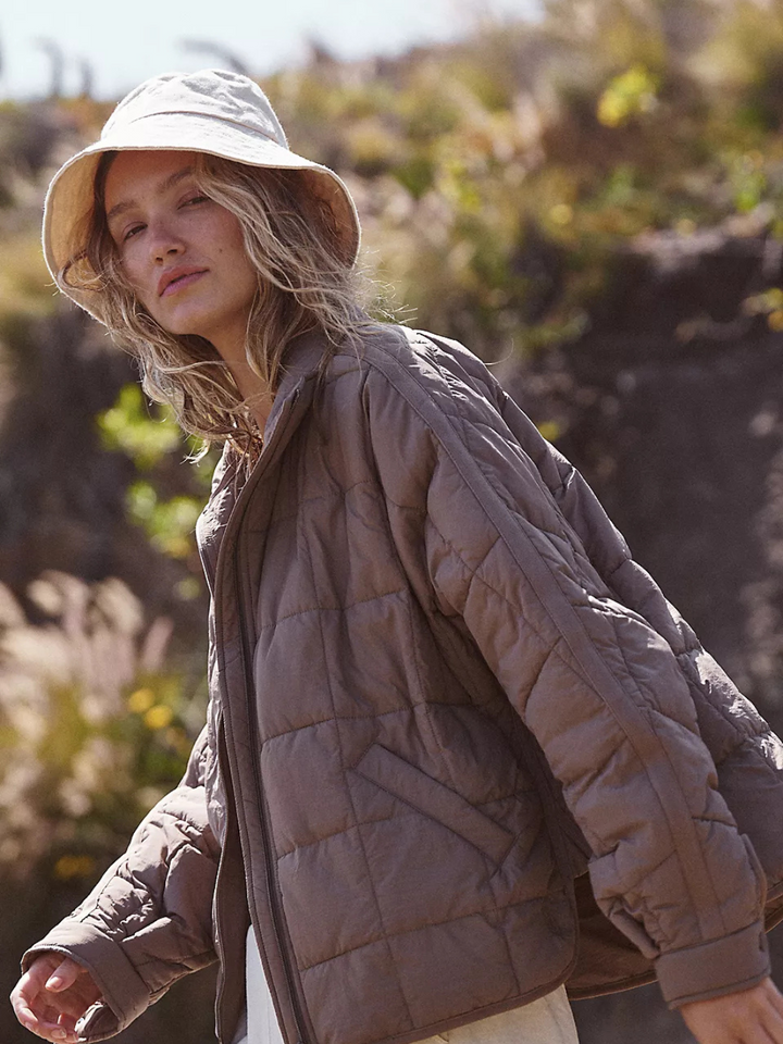 Free People Meet your new go-to outerwear: our first-ever performance puffer, designed to keep you warm, stylish, and ready for any adventure. This innovative puffer folds into its own pocket, transforming into a cozy travel pillow—perfect for planes, trains, and on-the-go lifestyles.