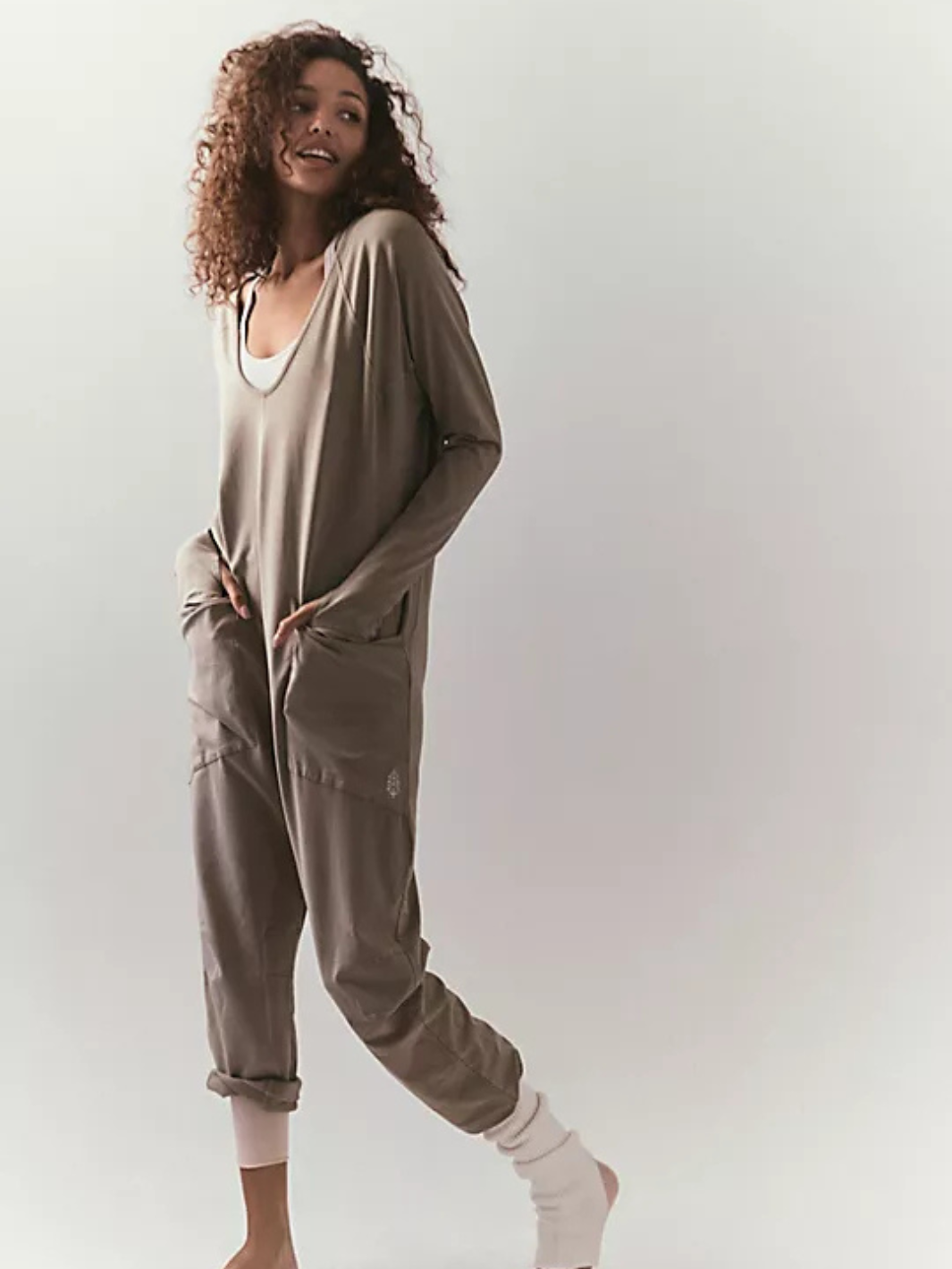 Your favorite onesie just got a winter-ready upgrade! Perfect for layering after a workout or lounging in ultimate comfort, this soft and cozy long-sleeve onesie features a relaxed, slouchy fit with a dropped crotch for effortless movement. Complete with convenient side pockets, it’s designed for both function and style—your go-to for chilly days and laid-back vibes.