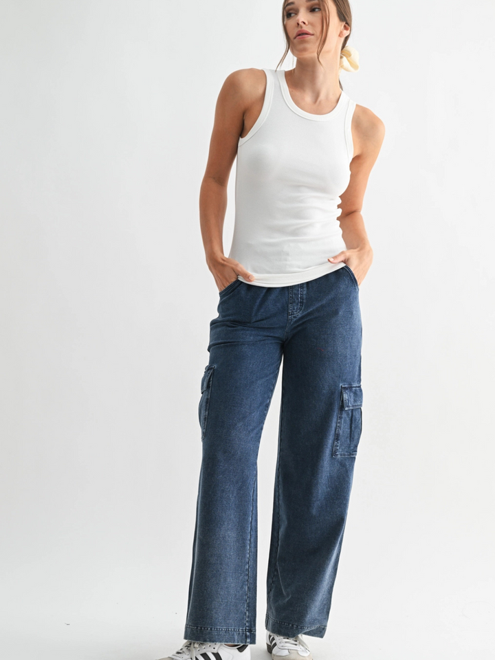 Go-To Micro Rib Tank Top in white on a model, paired with wide-leg denim cargo pants.