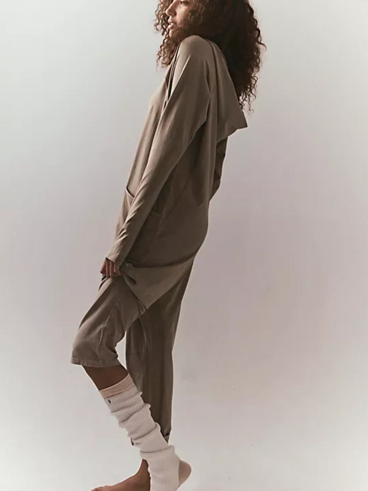 Your favorite onesie just got a winter-ready upgrade! Perfect for layering after a workout or lounging in ultimate comfort, this soft and cozy long-sleeve onesie features a relaxed, slouchy fit with a dropped crotch for effortless movement. Complete with convenient side pockets, it’s designed for both function and style—your go-to for chilly days and laid-back vibes.