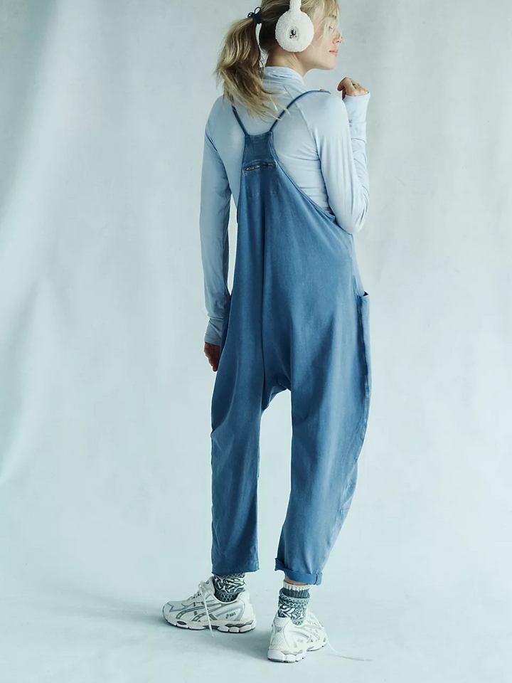 Find your fire with this FREE PEOPLE HOT SHOT ONESIE JUMPSUIT! This wardrobe essential features a low neckline, two handy pockets, drop crotch, oversized fit, and more! Stay warm and look stylish, all at the same time! It's the ultimate win-win! ;)