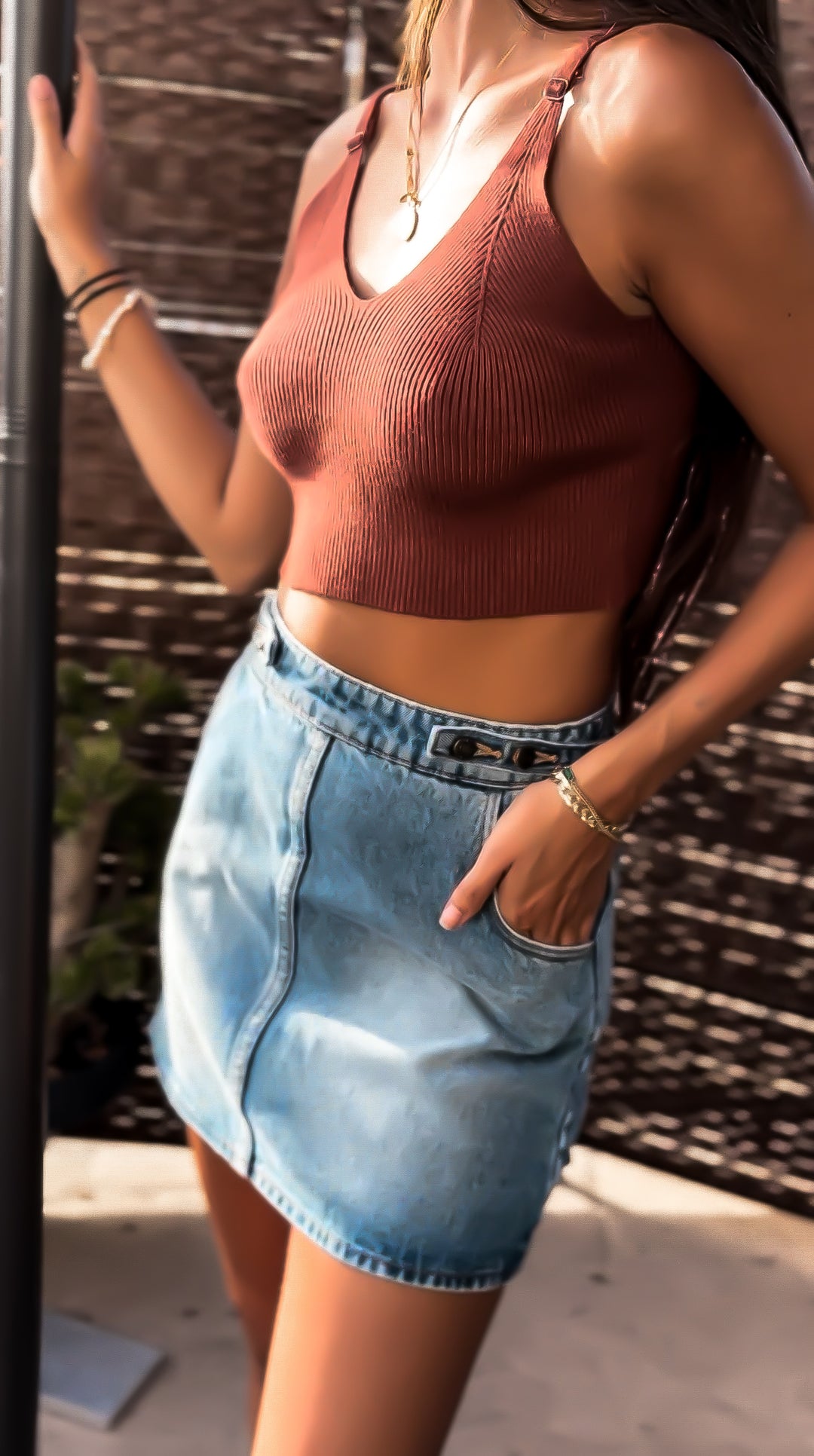 Stylish ROLLAS - Charlie Mini Skirt in faded denim, perfect for elevating your wardrobe this season.