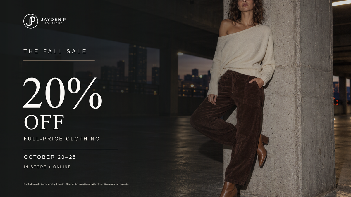 A promotional sale graphic for Jayden P Boutique featuring a model wearing a cream off-the-shoulder sweater and dark brown corduroy pants, leaning against a concrete pillar in an urban setting. The left side features text advertising 'The Fall Sale', '20% Off', and the dates 'October 20-25'.