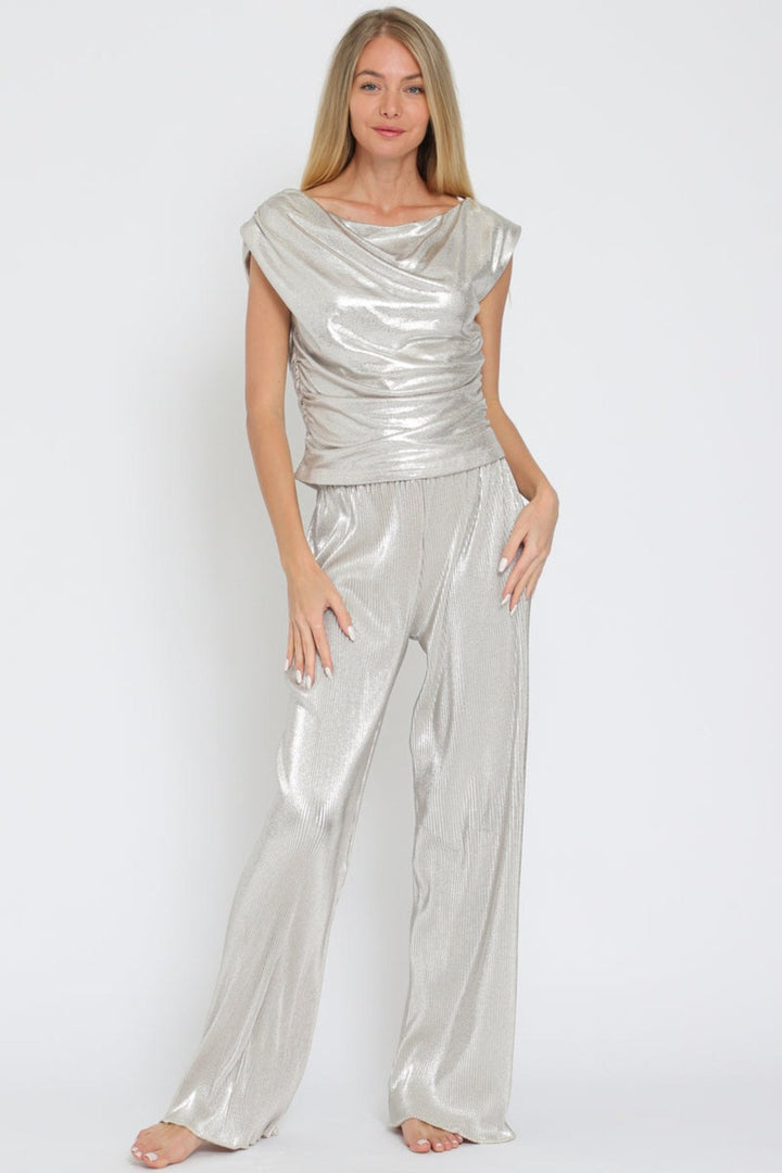 Eye-catching silver metallic set with a shiny texture and elegant cowl neck, perfect for any stylish occasion. JAZZY COWL NECK TOP JAYDEN P BOUTIQUE