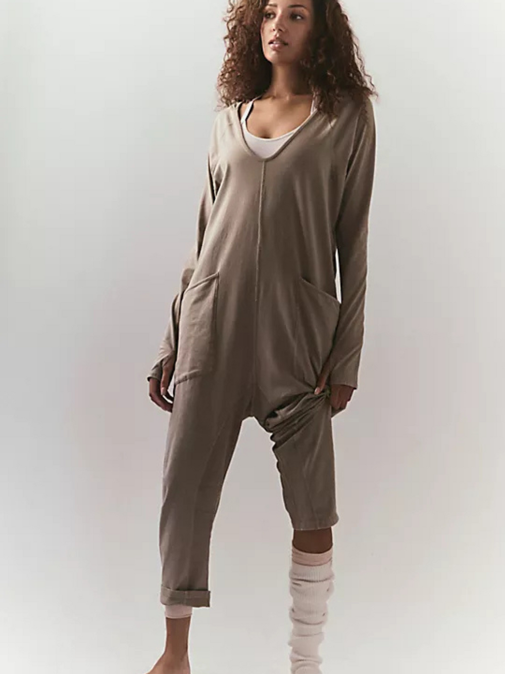 Your favorite onesie just got a winter-ready upgrade! Perfect for layering after a workout or lounging in ultimate comfort, this soft and cozy long-sleeve onesie features a relaxed, slouchy fit with a dropped crotch for effortless movement. Complete with convenient side pockets, it’s designed for both function and style—your go-to for chilly days and laid-back vibes.