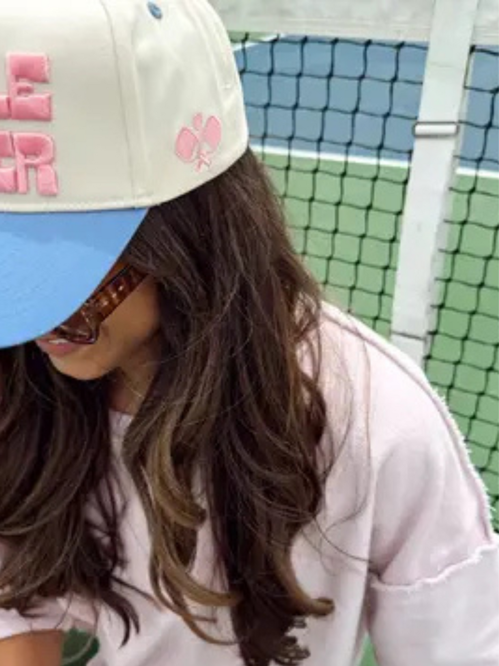 KENZKUSTOMZ Pickleballer Vintage Trucker Hat on a person, featuring pink 3D 'Pickle Baller' embroidery and side detail