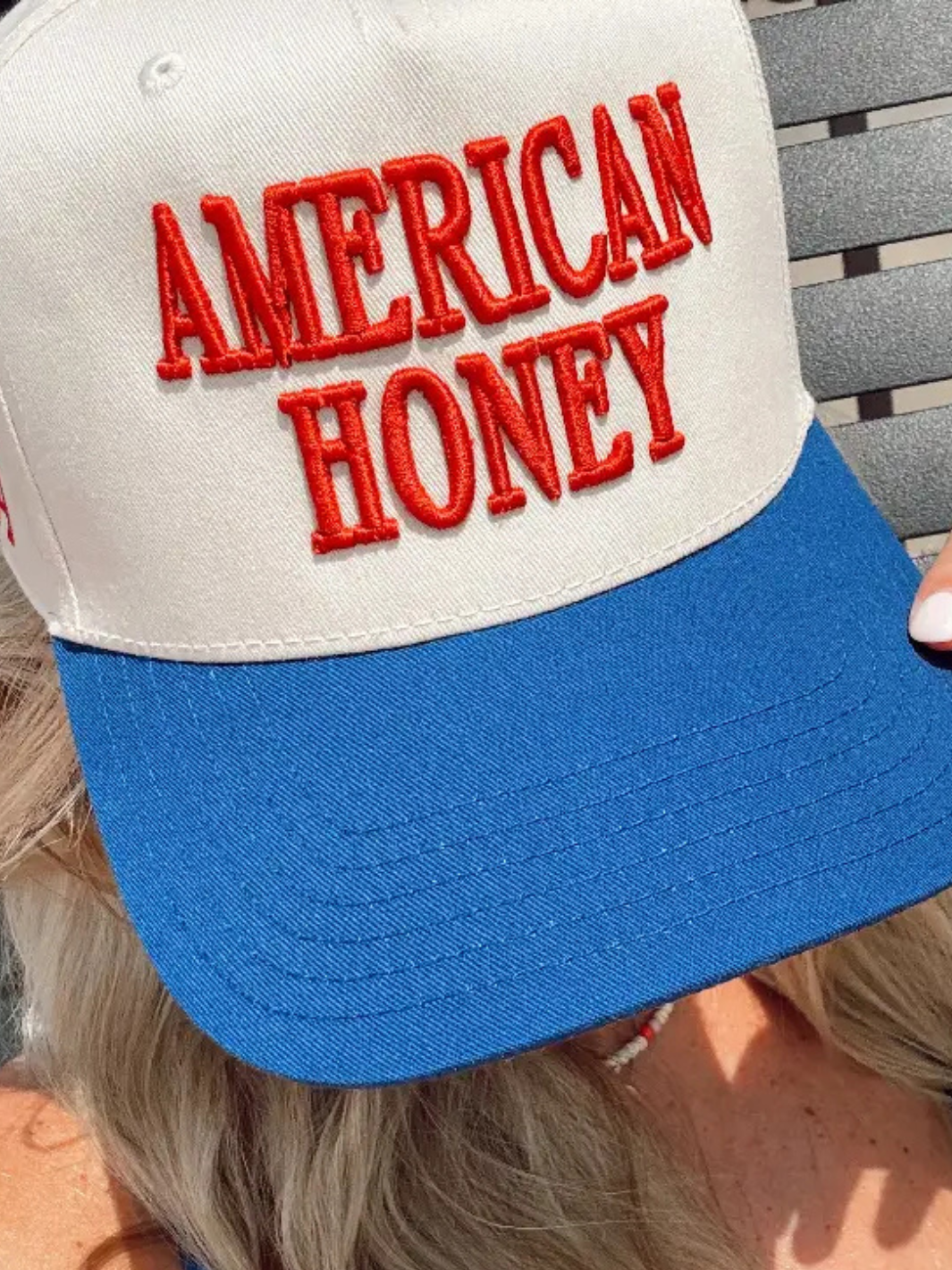 KENZKUSTOMZ - American Honey Trucker Hat features bold red lettering on a stylish blue and white cap, perfect for casual wear.