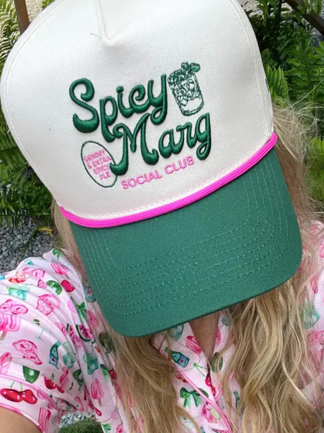 Get noticed in the KENZKUSTOMZ - Spicy Marg Social Club Trucker Hat, featuring a green vintage style and playful pink accents.