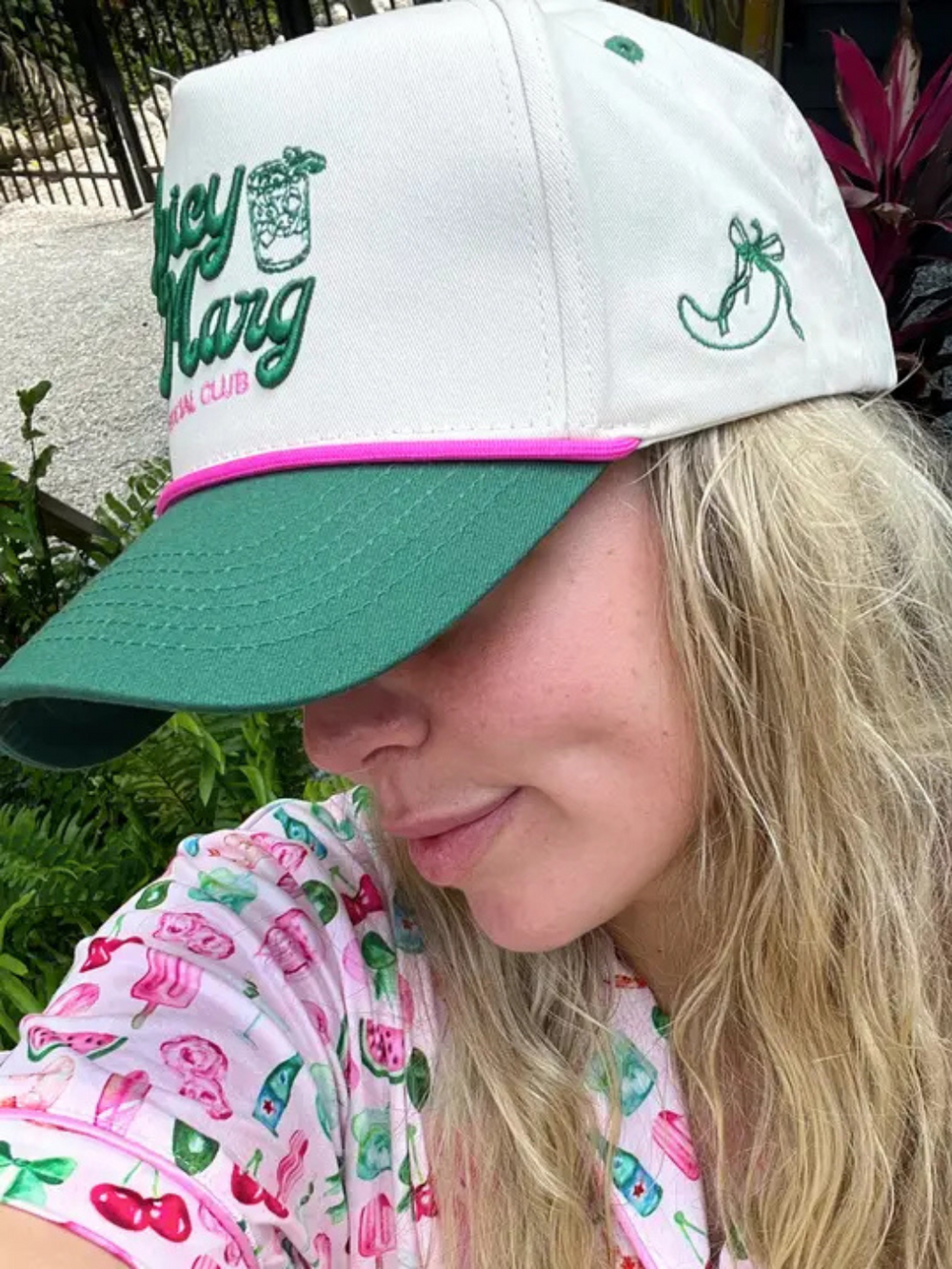 KENZKUSTOMZ - Spicy Marg Social Club Trucker Hat features a green vintage style with playful pink accents.