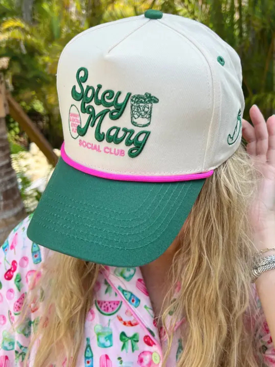 KENZKUSTOMZ - Spicy Marg Social Club Trucker Hat features a playful design with green and pink accents for a bold look.