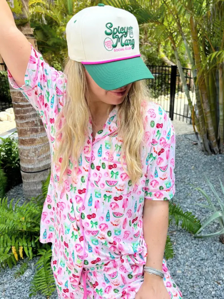 Stylish KENZKUSTOMZ - Spicy Marg Social Club Trucker Hat with vibrant colors, perfect for a fun, casual look.