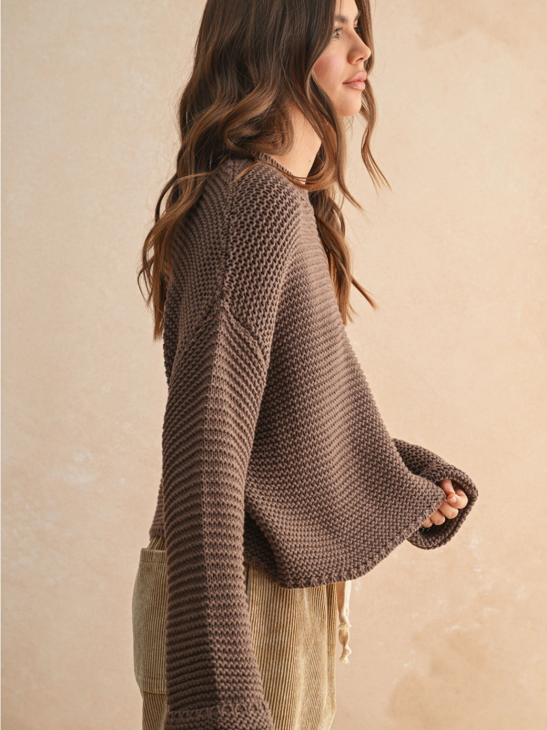 Laid-Back Luxe Chunky Knit Top in warm brown with relaxed oversized fit and round neckline, worn by a model.