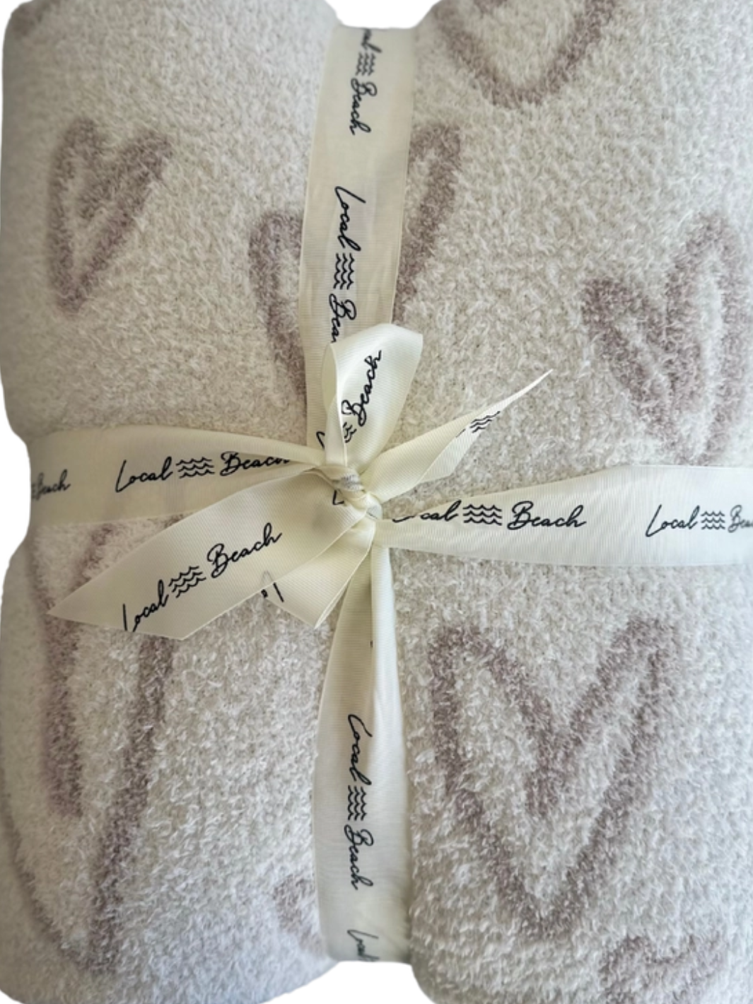 Local Beach Love Collection blanket, extra-large reversible throw in beige, tied with cream ribbon reading Local Beach.