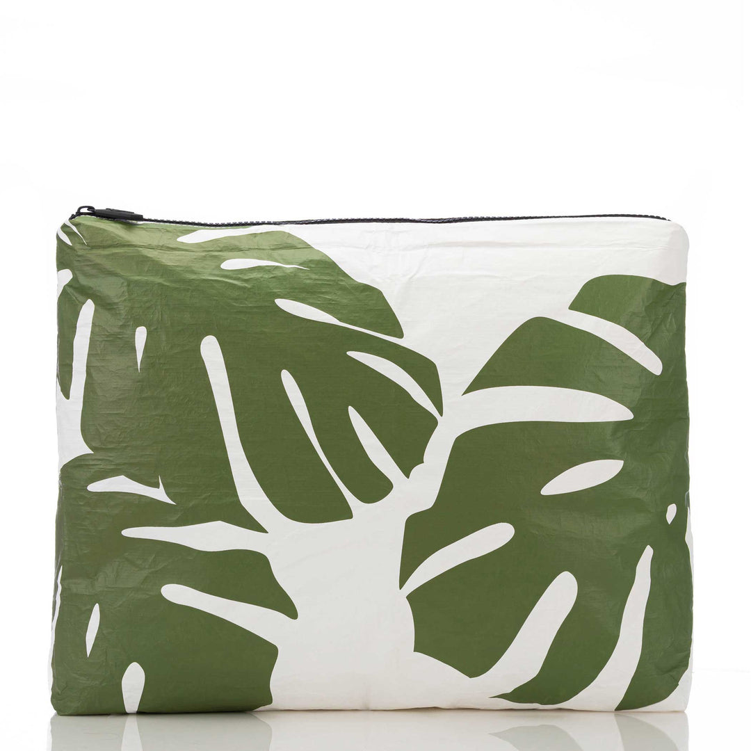 White MAX Pouch with large seaweed-green monstera leaves, front view with black zipper
