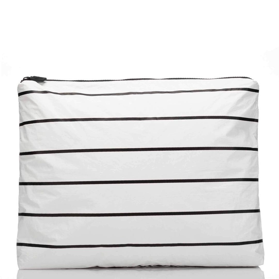 White MAX Pouch with horizontal black stripes, front view with black zipper