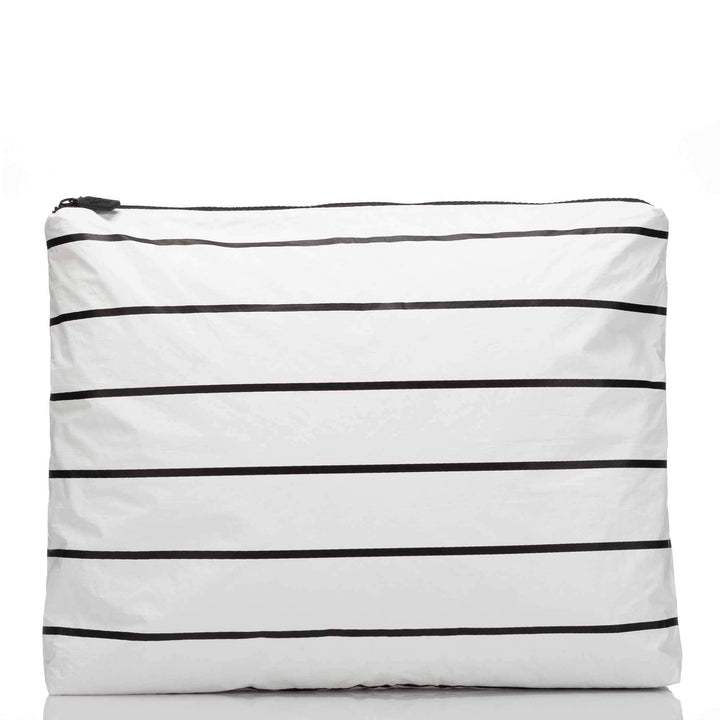 White MAX Pouch with horizontal black stripes, front view with black zipper
