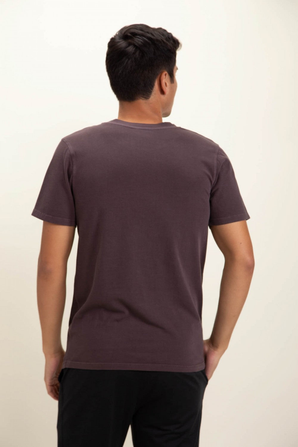 Stretchy and breathable (thanks to the pima cotton and spandex fibers), this t-shirt also features a round neckline, short sleeves, and topstitch across the neckline and the armhole.