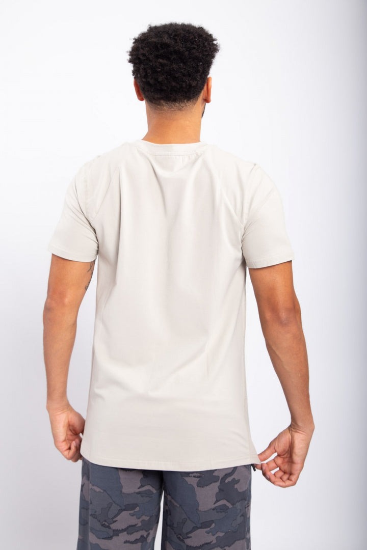 Your new go to tee is this classic crew neck. It features raglan short sleeves and a flattering silhouette.