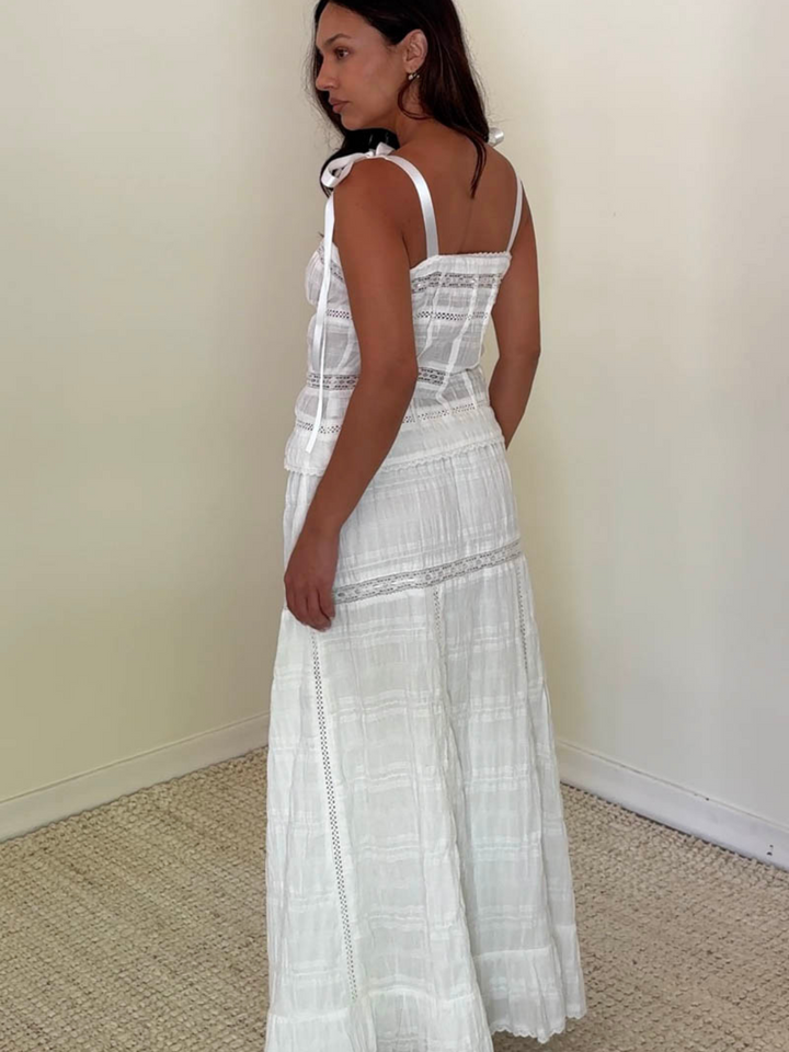 Stylish Meadow Muse Sweetheart Tie-Strap Top with ribbon ties, featured in a breezy summer-ready two-piece set.