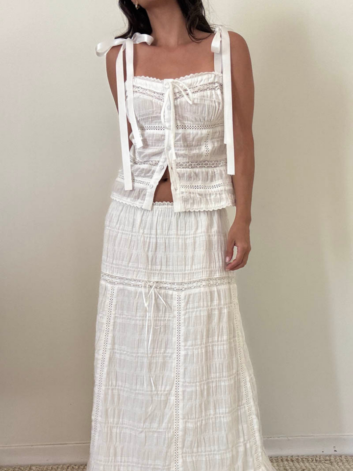 Elevate your style with the Meadow Muse Sweetheart Tie-Strap Top, perfect for summer brunches and effortless chic.