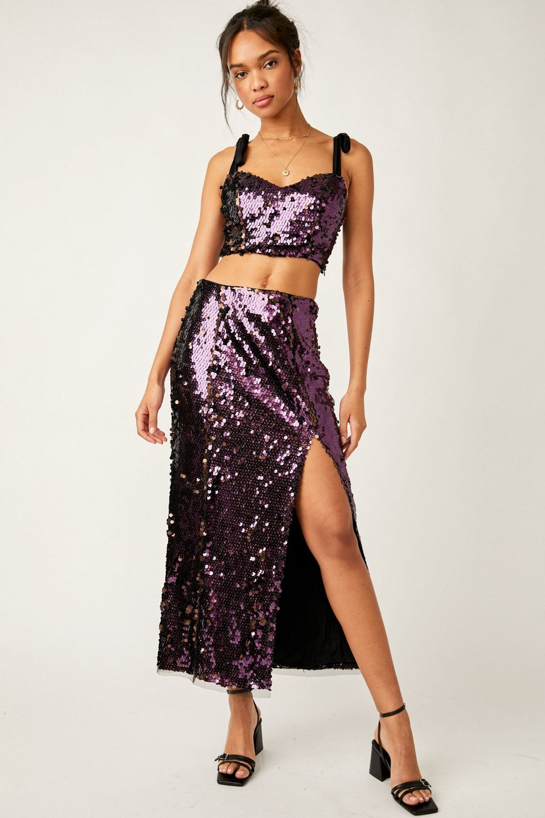 Feel the glam in this star bright sequined maxi skirt! The side slit gives your look a flirty flair and the zipper closure ensures you're party ready. Sparkle all night long in this swoon-worthy skirt!