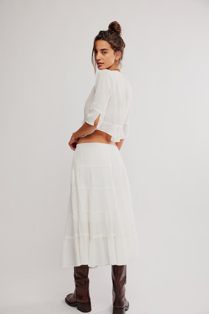 Free People Bright Side Skirt: white tiered maxi with movement, shown with top and brown knee-high boots.
