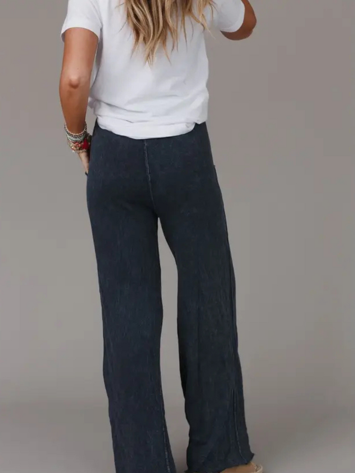 Relaxing Robin Wide Leg Pant in dark French terry boho lounge pants with drawstring waist and raw-edge seams.
