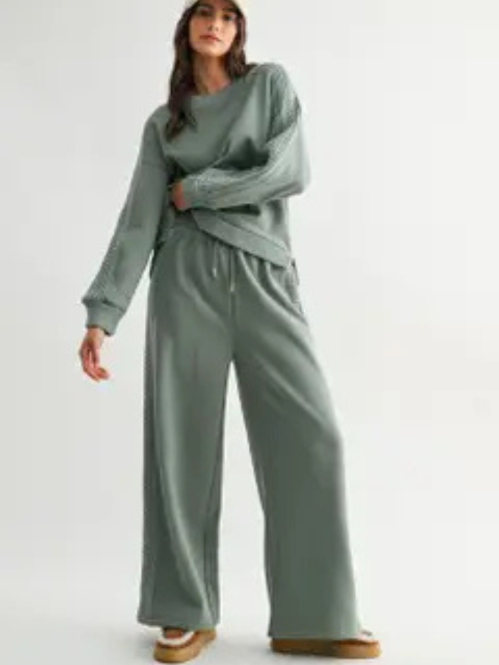 The Aria Cable Knit Wide Leg Pant in sage, plush-knit loungewear with a relaxed, wide-leg silhouette.