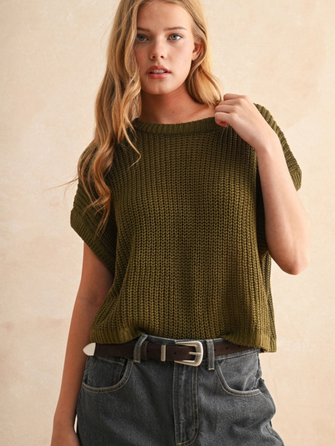 The Capsule Knit Sleeveless Sweater Top in olive, Laid-Back Luxe capsule essential for everyday wear.