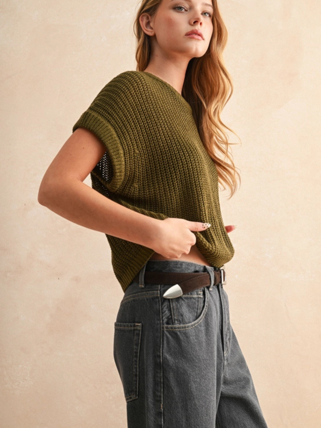 The Capsule Knit Sleeveless Sweater Top in olive, relaxed boxy knit for everyday style.