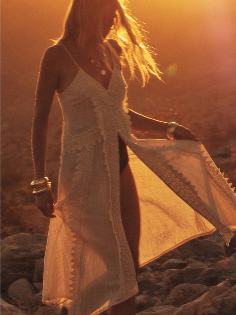 The Desert Muse Maxi Top in airy cotton gauze with Venice lace trim, flowing silhouette on a model at sunset.