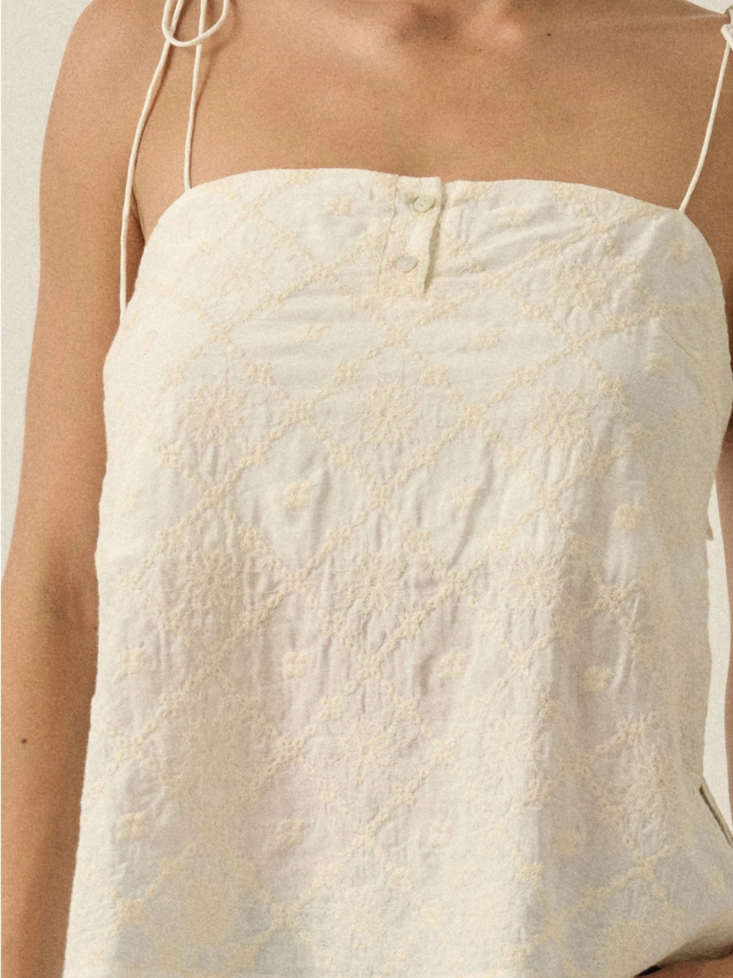 Seafoam Embroidered Cami with delicate floral embroidery on lightweight woven fabric and spaghetti straps.