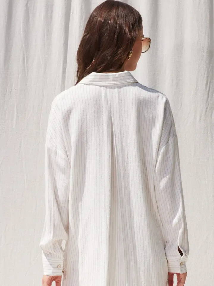 Flowy back view of The Seaside Stripe Linen Button-Down Top, perfect for breezy coastal outings. Effortless style!