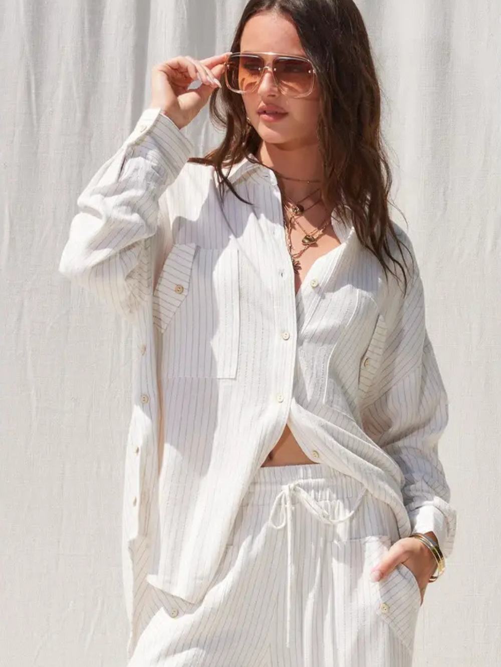 Effortlessly stylish, The Seaside Stripe Linen Pants offer a relaxed fit perfect for warm, carefree days.