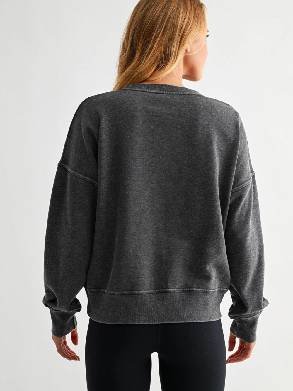 Vintage Fade Fleece Pullover in charcoal gray with relaxed fit, drop shoulders, ribbed cuffs (back view)