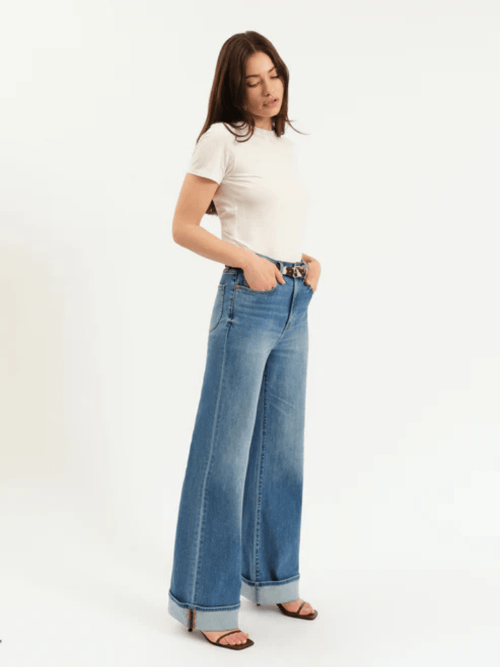DAZE DENIM Far Out High Rise Wide Leg Jeans in light wash with belted waist and rolled cuffs.