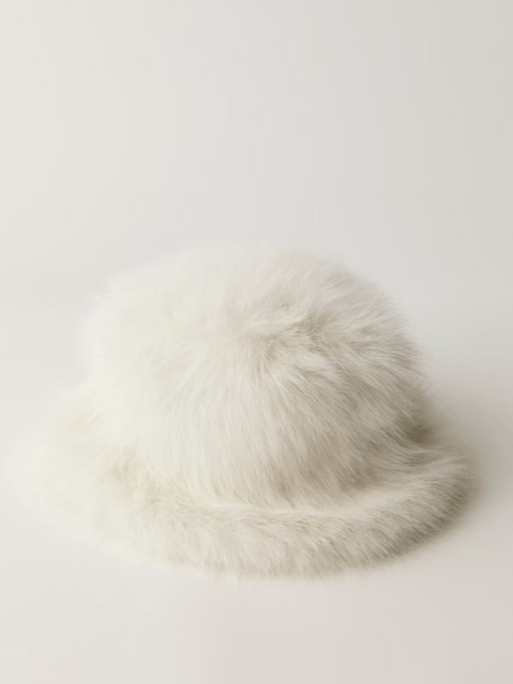 White faux-fur Ice Queen bucket hat with plush texture and cozy warmth