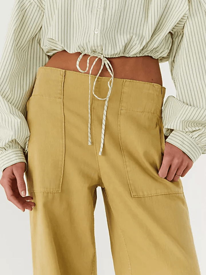 Free People We The Free breezy pull-on denim jeans, mid-rise tan with drawstring waist and patch pockets.