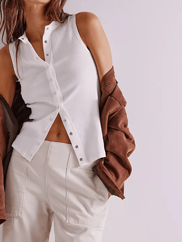 Free People We The Free Breezy Denim Pull-On Jeans on a model wearing a white top and brown jacket.