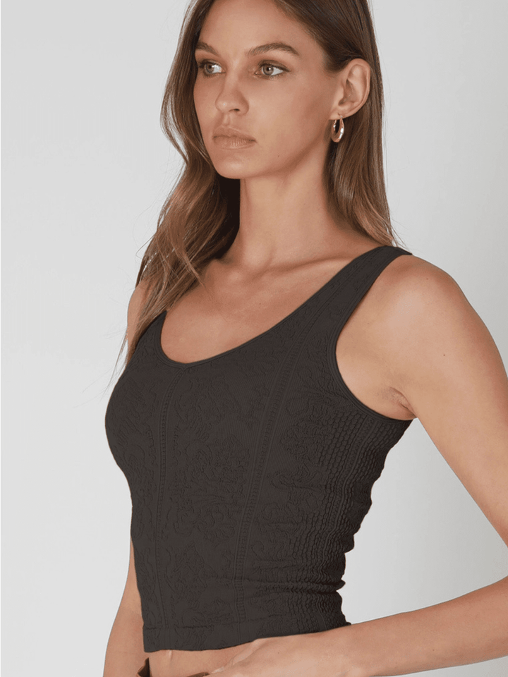 NIKIBIKI - The Amara Reversible Lace Top, black textured lace, stretchy nylon-spandex, sleeveless crop.